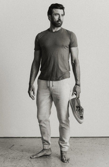 fit model standing in The Cotton Hemp Tee in Olive