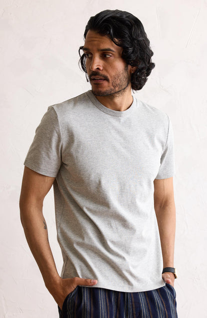 Our model wearing the organic cotton tee in heather grey