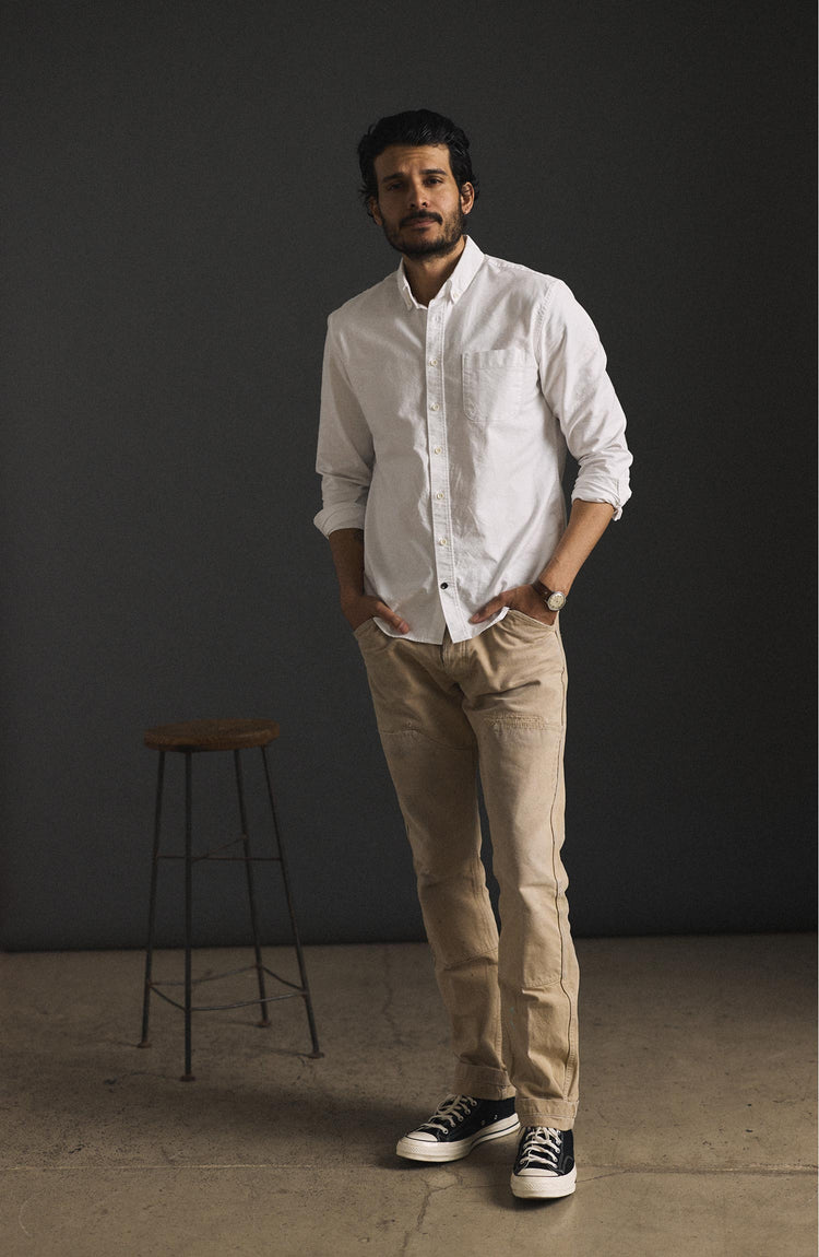 fit model wearing the white jack indoors