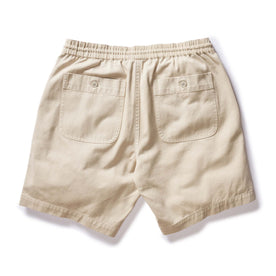 material shot of the back of The Apres Short in Organic Aged Stone Foundation Twill