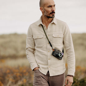 fit model walking in The Division Shirt in Birch