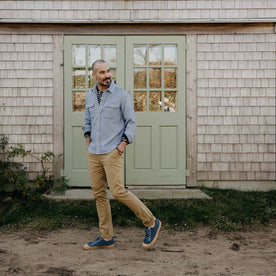 fit model walking in The Division Shirt in Washed Indigo