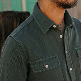 fit model showing off the buttons on The Ledge Shirt in Deep Sea Twill