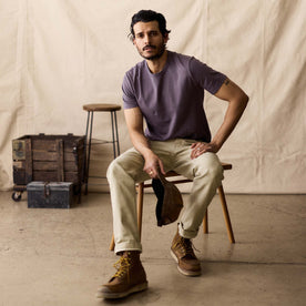 fit model sitting in The Organic Cotton Tee in Dried Plum