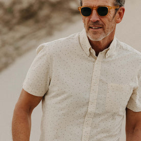 fit model showing the front of The Short Sleeve Jack in Heather Oat Dot