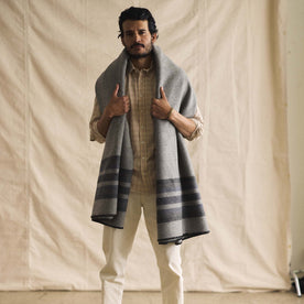 fit model with The Wool Blanket in Bay Stripe around his shoulders