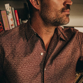 fit model wearing The Short Sleeve Hawthorne in Burgundy Trellis, chest detail