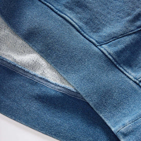 material shot of the bottom of The Apres Hoodie in Washed Indigo Terry