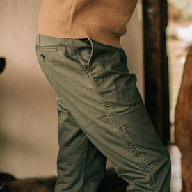 fit model wearing Foundation Pant, side