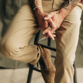 fit model sitting in the Foundation Pant