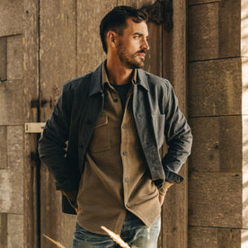 fit model walking in The Ojai Jacket in Organic Charcoal Foundation Twill