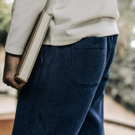 fit model showing off back detail on The Apres Pant in Indigo Waffle