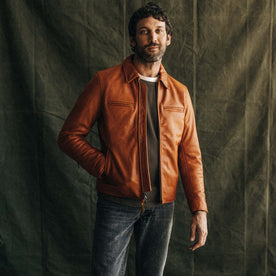 fit model posing in The Moto Jacket in Whiskey Steerhide