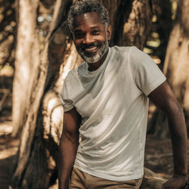fit model showing the front of The Cotton Hemp Tee in Heathered Oat