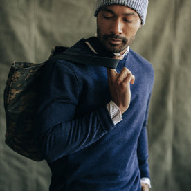 fit model carrying a tote in The Apres Crew in Indigo Terry