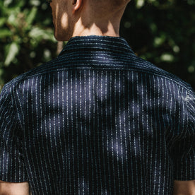 Our fit model wearing the Short Sleeve Hawthorne in Indigo Moon Phase walking in San Francisco.