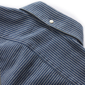material shot of the button on the back of the collar of The Jack in Roped Indigo